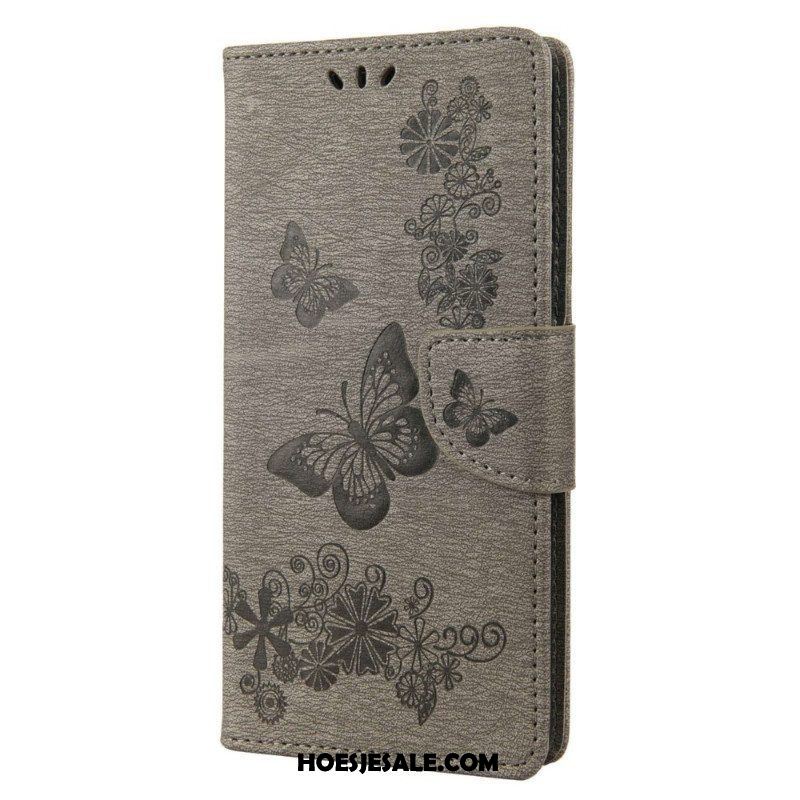 Leren Hoesje voor Samsung Galaxy M23 5G Met Ketting String Vlinders